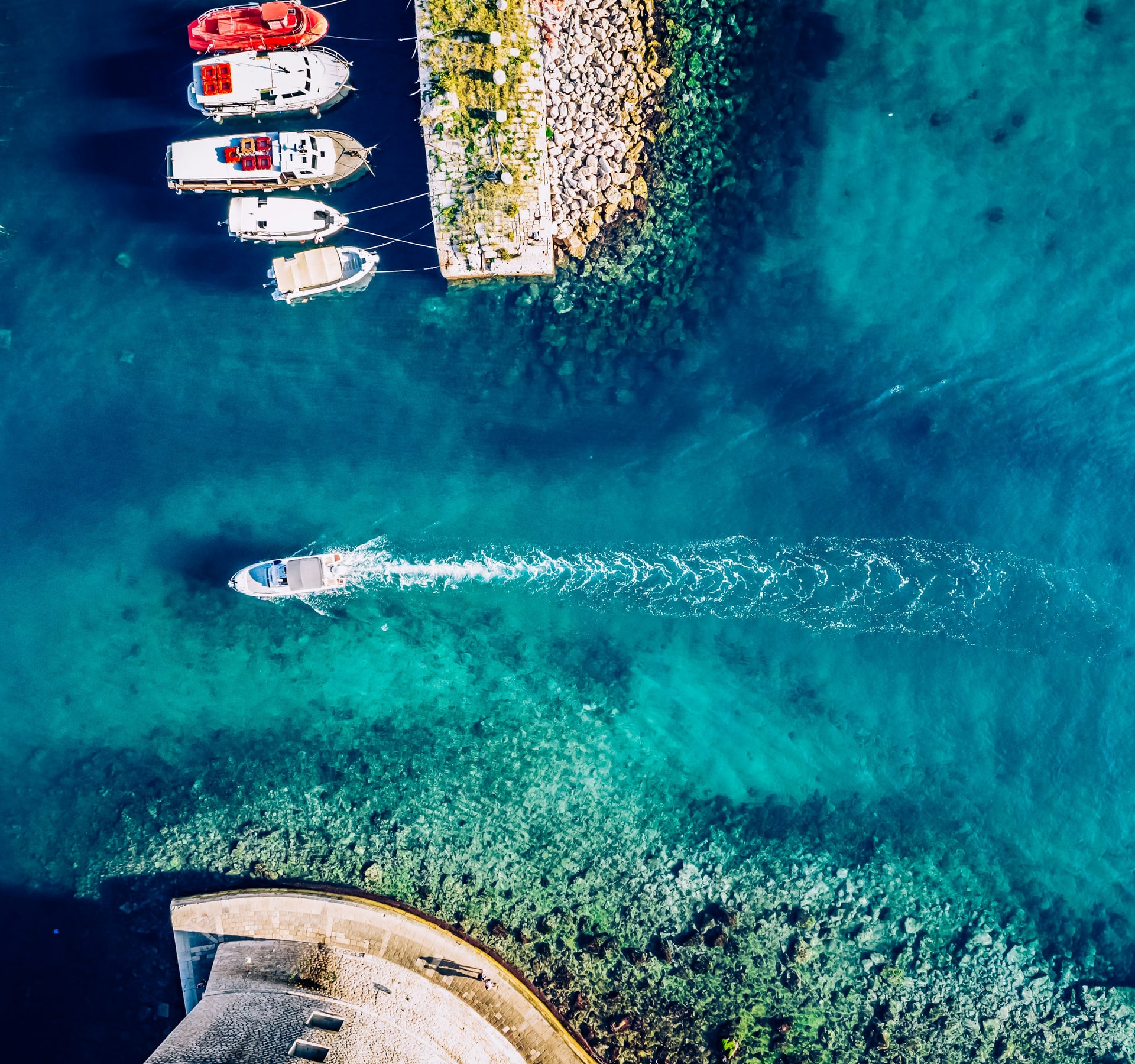 Aerial view of boats and yachts in Dubrovnik harbour for island and ferry transfers in Croatia